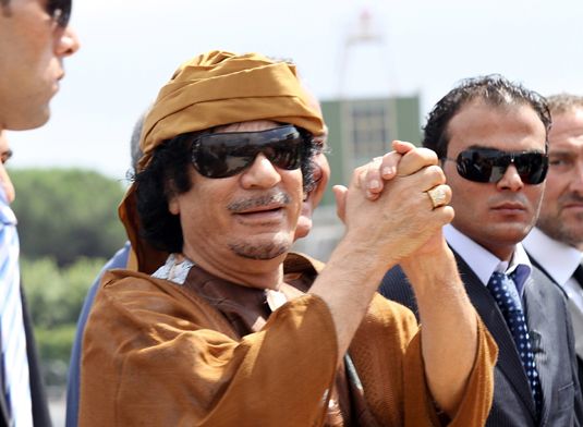 Photographie - Le colonel Mouammar Kadhafi: l'histoire de la Libye menant à la guerre civile