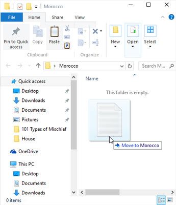 Déplacer la souris entraîne le fichier avec elle, et Windows explique que vous're moving the file. (B