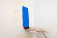 Comment couper dans les bords d'un mur avec un pinceau