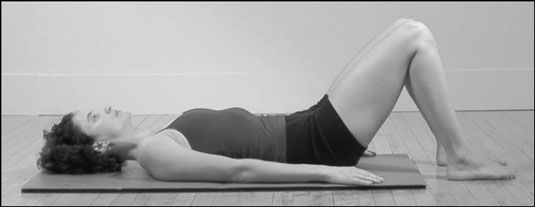 La position abdominale Scoop dans la méthode Pilates.