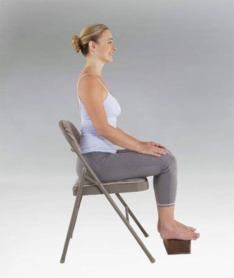 Comment faire la posture de yoga chaise-sitting