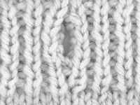 Photographie - Comment tricoter une boutonnière verticale