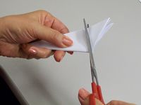 Comment faire un flocon de neige de papier à huit pointes