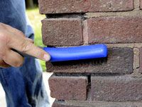 Comment patcher mortier sur les murs de briques
