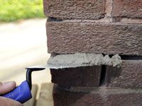 Comment patcher mortier sur les murs de briques