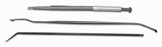 Trois différents types d'outils de greffage.