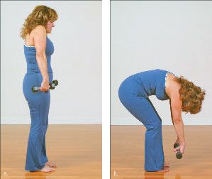 Photographie - Comment soulager les maux de dos avec un tronçon de yoga avec des poids-