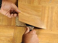 Comment remplacer les tuiles de plancher en vinyle