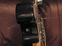Photographie - Comment restring une guitare électrique qui a retenue à cordes