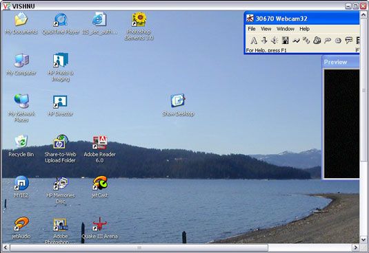 Un autre ordinateur's desktop appears in your laptop's window.