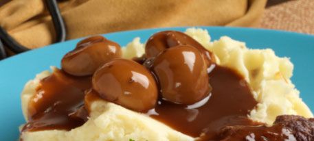 Photographie - Recette pour les pommes de terre à la crème d'or avec sauce aux champignons
