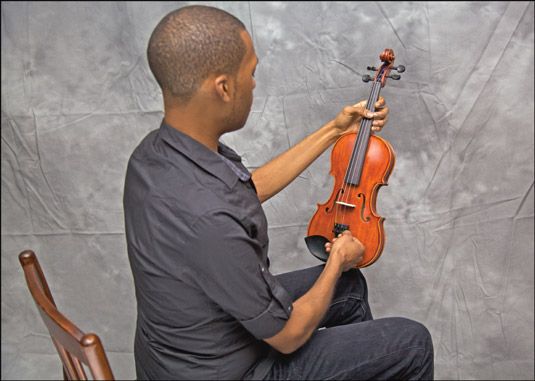 Photographie - Travailler les chevilles du violon et tendeurs